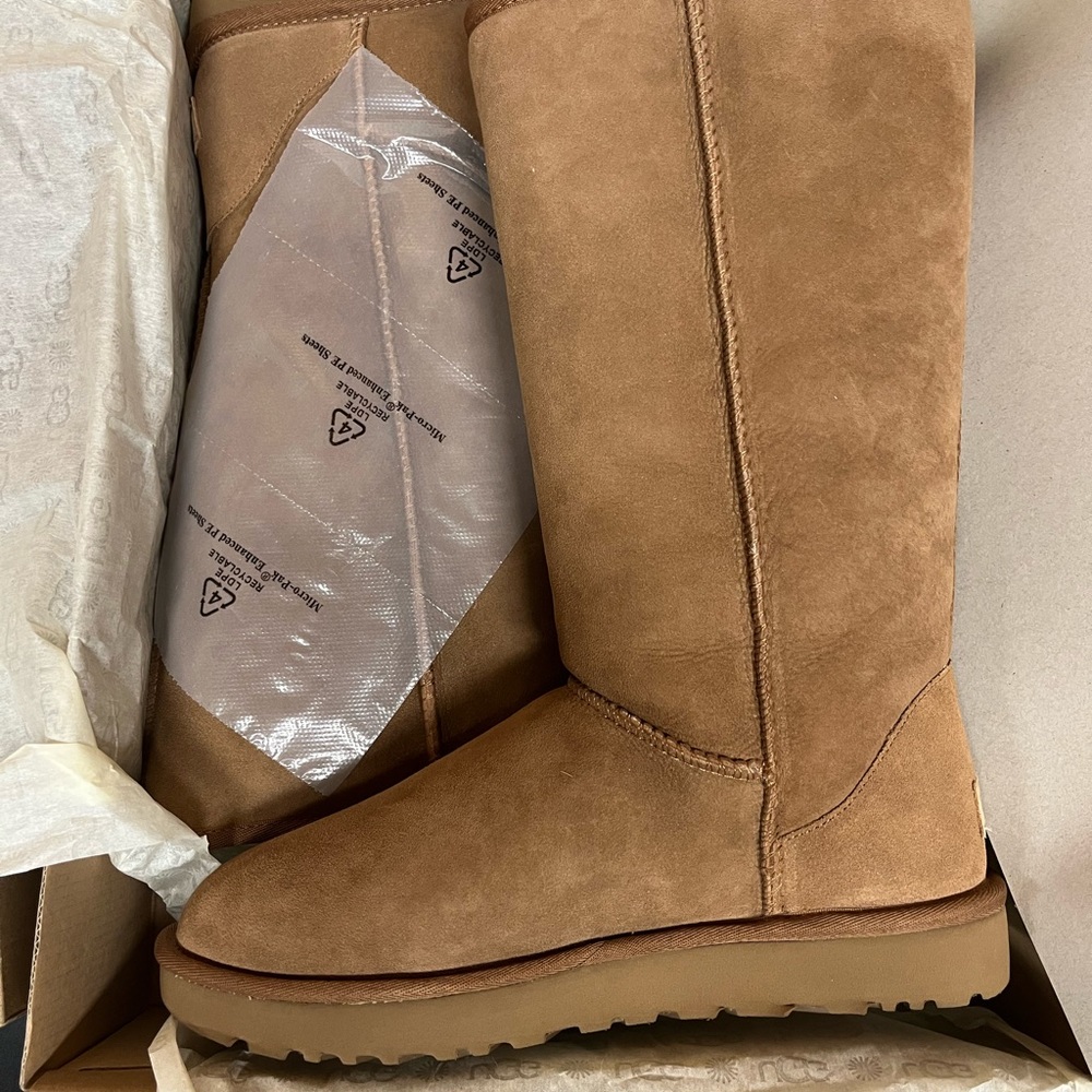 Ugg W classic tall ii boot, size nine. Brand new in the box, never worn